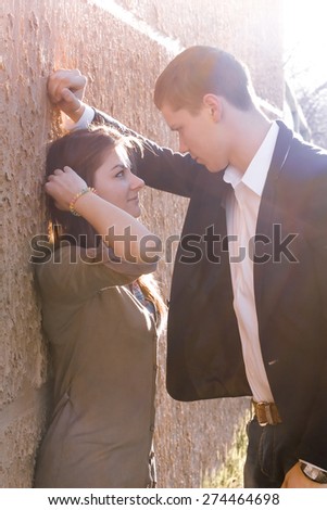 young couple in love outdoor sunrise