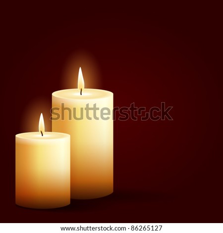 isolated burning candles on dark red background