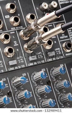 Audio connectors with cable connected to sound mixer