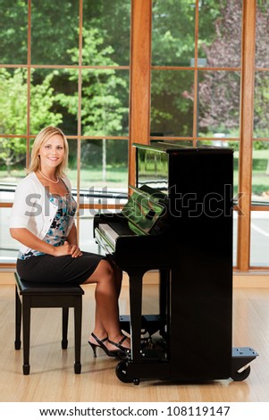 Piano teacher at her studio