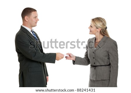 Male and female business people exchanging business card isolated on a white background