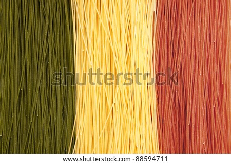Dried spaghetti noodles in Italian flag colors