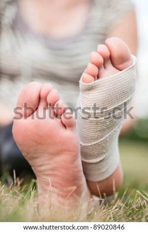Woman with bandaged foot