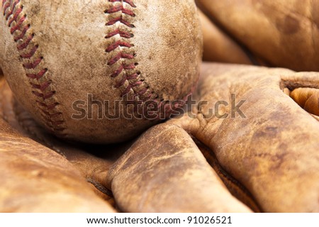 Vintage baseball and glove closeup