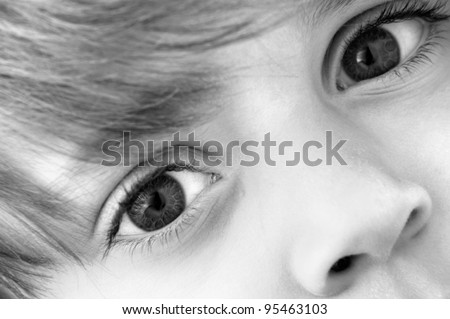 Little boy eyes in black and white