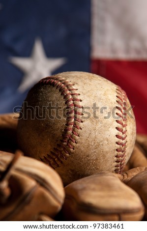 Vintage baseball and glove with American flag
