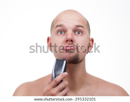 a man shaving electric machine