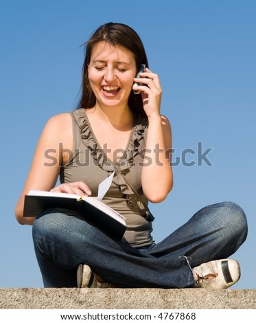 girl writes to writing-books and speaks by phone