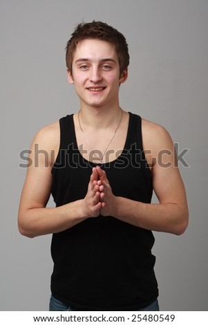 Greeting. Pleased to meet you. Young man on a white background.