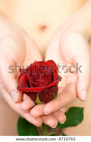 Woman holding rose