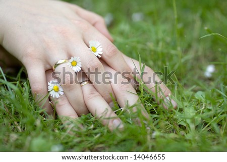 stock photo : Couple holding hands with wedding rings