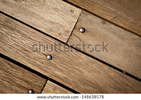 surface of the board with a nail head