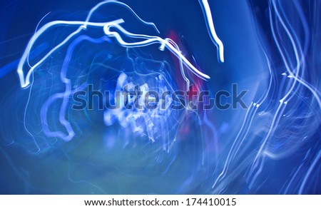 chaotic blue abstract background with  white lines and red spots
