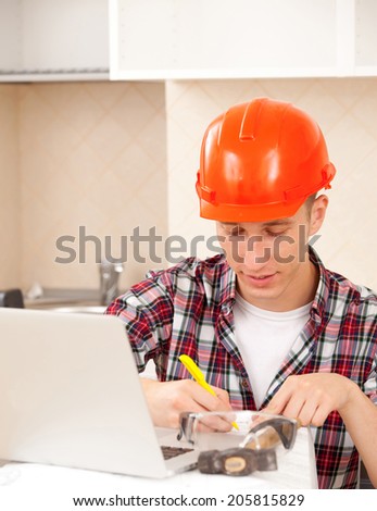Foreman makes the calculations before work