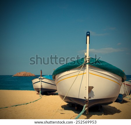 fishing boat boat on the shore of the blue sea, instagram image style
