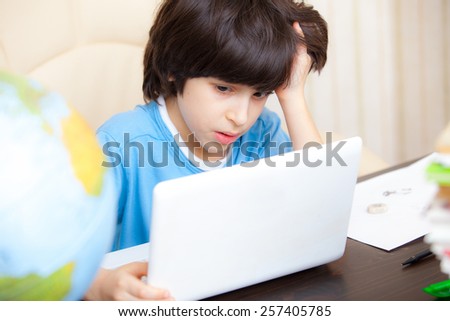 distance learning, a boy with computer