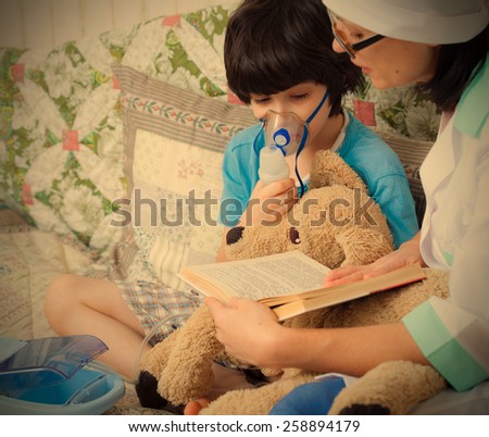 children\'s doctor spends boy inhalation session and reads him a book. instagram image retro style