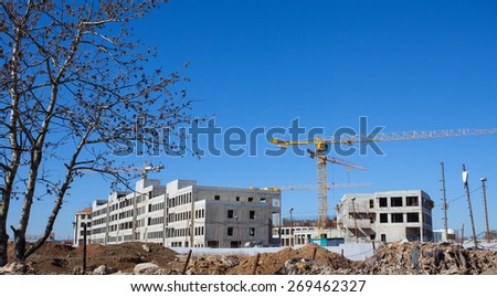 construction of an office complex at spring sunny day