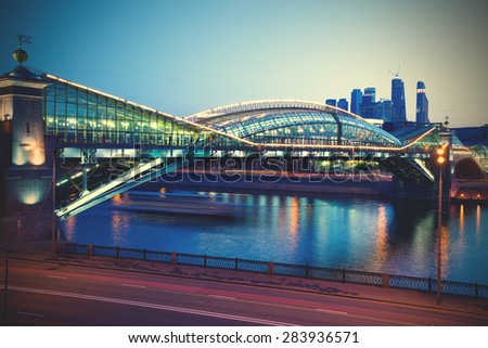 cityscape of the Moscow city with Bogdan Hmelnitsky covered bridge at spring evening. instagram image filter retro style