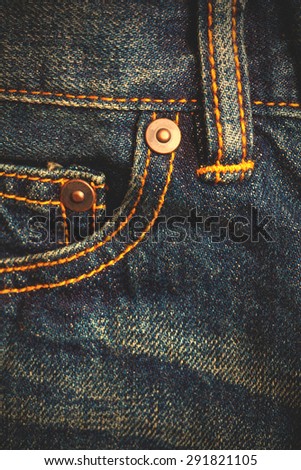 blue jeans, close up front view with pockets and rivets. instagram image filter retro style