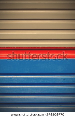 blue-gray background with a red stripe. wall of an old railway car. instagram image filter retro style