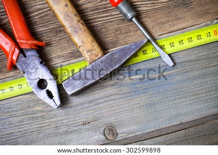 old pliers, used a hammer and ancient screwdriver on the vintage workbench