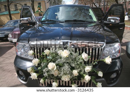 Wedding Car with Bouquet of  Roses