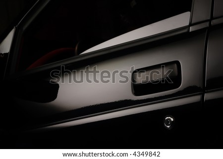 stock photo Fragment of the Black Car Door with Omitted Glass