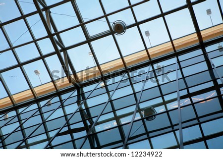 abstraction, transparent ceiling of the modern office building with orange stripe