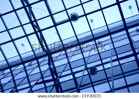 abstraction, metallic-glass design of the ceiling and wall of the modern urban office building