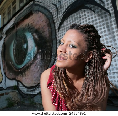 stock photo smiling beautiful black girl with exotic hairstyle