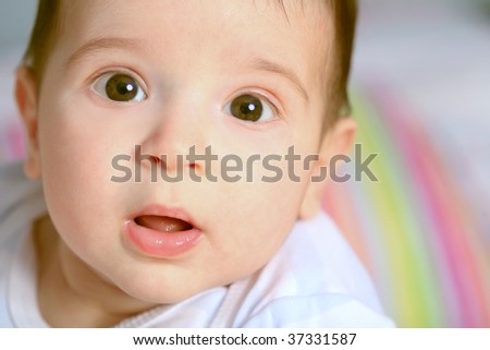 close-up portrait of the baby open-mouthed