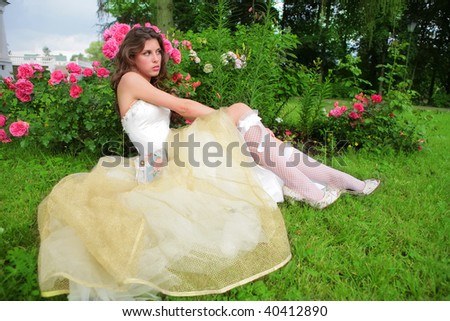 beautiful princess in white-golden gown dreams of future