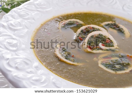 Cabbage soup with meat rolls