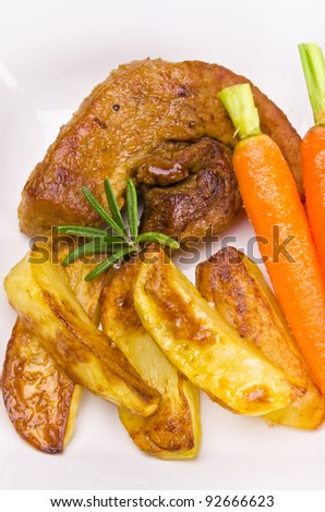 baked potatoes with meat and carrots