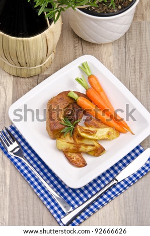 baked potatoes with meat and carrots
