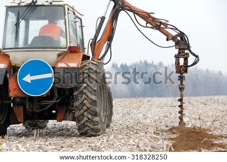 boring holes in ground with drilling rig machine