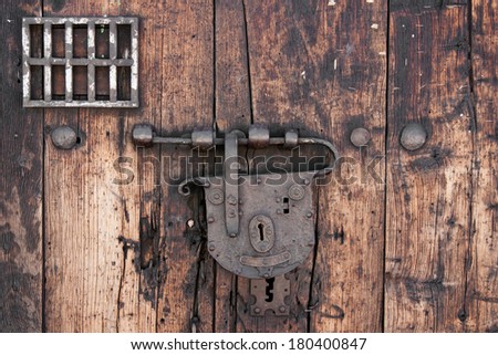 Detail of an old door and lock in colonial Cartagena (Colombia, South America)