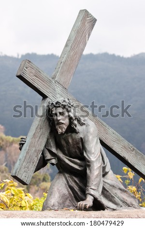 BOGOTA, COLOMBIA - DECEMBER 25: Christ carrying the cross. One of many bronze sculptures on the mountain of Monserrate representing the Stations of the Cross. December 25, 2013 in Bogota, Colombia.
