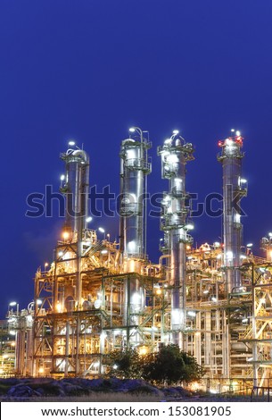 Night scene of Petrochemical industrial plant with blue sky
