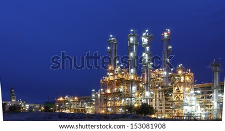Night scene of Petrochemical industrial plant with blue sky