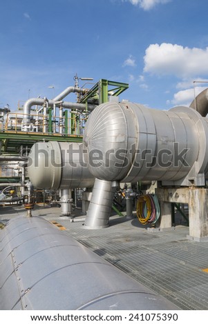 Process area of refining factory with blue sky