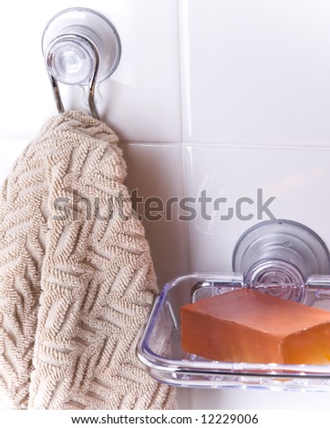 Bright scene with soap and hanging wash cloth.