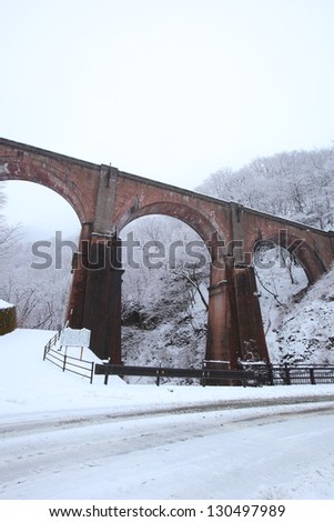 Brick arched bridge of the snow scene, Gunma, Japan
