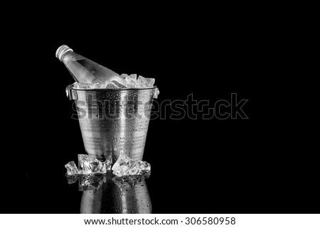 Bottle of Natural Mineral Water in Ice Bucket