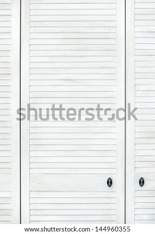 White modern wooden door in Shabby shic or Provence style. Vertical wooden background