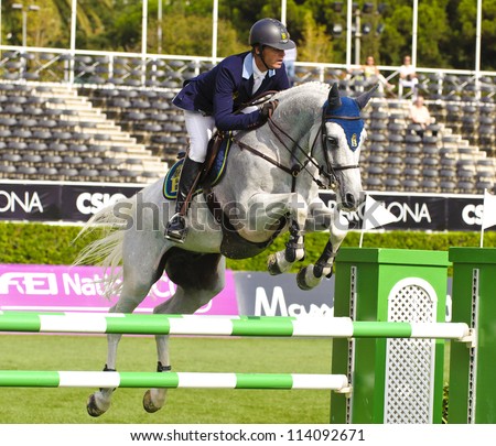 BARCELONA -Â?Â? SEPTEMBER 21: Rutherford Lathan in action during the CSIO 101th International jumping competition in Real Club Polo Barcelona, on September 21, 2012, Barcelona, Spain.