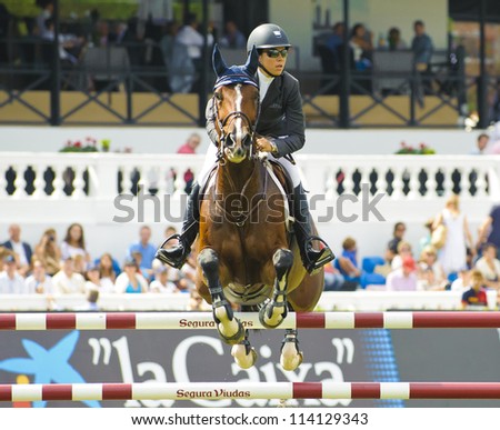 BARCELONA - SEPTEMBER 22: Brianne Goutal in action during the CSIO 101th International jumping competition in Real Club Polo Barcelona, on September 22, 2012, Barcelona, Spain.