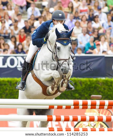 BARCELONA - SEPTEMBER 23: Daniel Zetterman rider in action during the CSIO 101th International jumping competition in Real Club Polo Barcelona, on September 23, 2012, Barcelona, Spain.