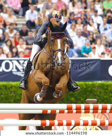 BARCELONA - SEPTEMBER 23: Pilar Lucrecia Cordon rider in action during the CSIO 101th International jumping competition in Real Club Polo Barcelona, on September 23, 2012, Barcelona, Spain.